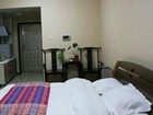 фото отеля Saga Inn Jinbi Apartment Kunming