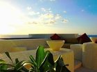 фото отеля Puerta Al Mar Condominiums Isla Mujeres