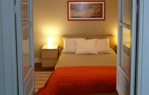 фото отеля Apartamentos Junto a la Giralda