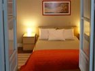 фото отеля Apartamentos Junto a la Giralda
