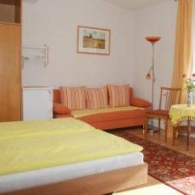 фото отеля Ferienwohnungen Käfer Pension