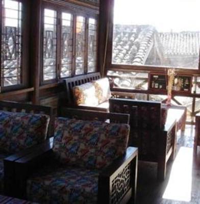 фото отеля Lijiang Qifen Inn