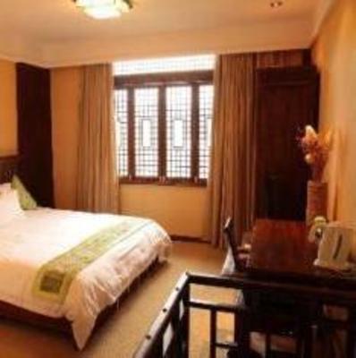 фото отеля Lijiang Qifen Inn