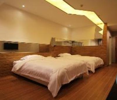 фото отеля Chuangyi Shishang Hotel (Qingdao Lvdao Jiayuan)