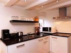 фото отеля Rembrandt Square Apartment Suites