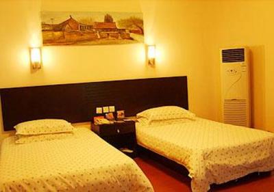 фото отеля Tongling Huating Business Hotel