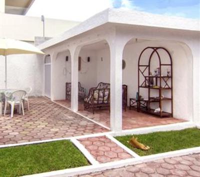 фото отеля La Petite France Vacation Rentals Puerto Morelos