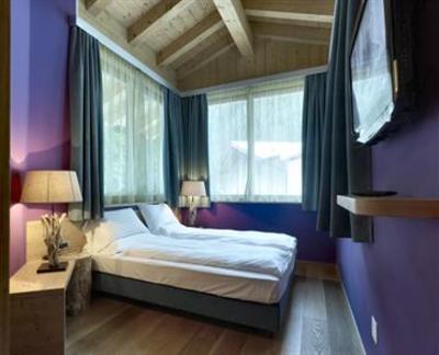 фото отеля Color Home Suite Apartments Predazzo