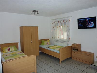 фото отеля Und Ferienwohnungen Pension