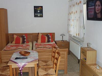 фото отеля Und Ferienwohnungen Pension