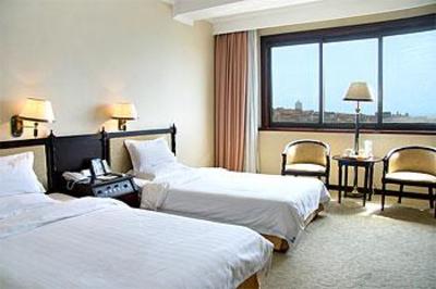 фото отеля Qingdao Huaneng Hotel