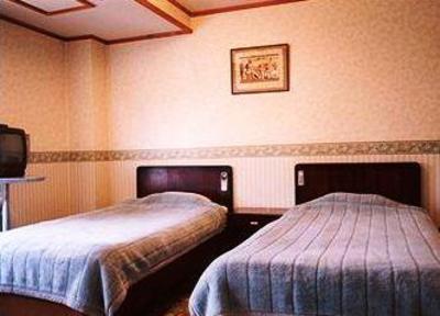 фото отеля Tommy Rich Inn Kyoto