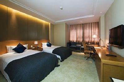 фото отеля Nanjing New Town Hotel
