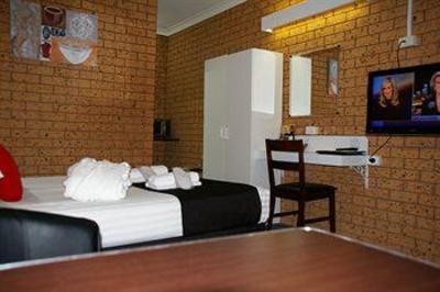 фото отеля Golden Harvest Motor Inn