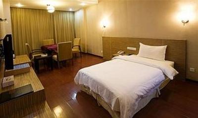 фото отеля Xingcheng Aosheng Business Hotel