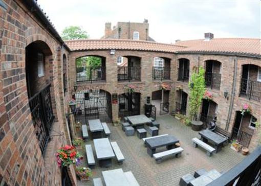 фото отеля The Exchange Coach House Inn