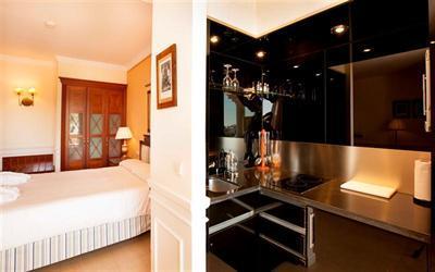 фото отеля Apartamentos Guadalpin Boutique