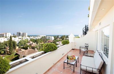 фото отеля Apartamentos Guadalpin Boutique