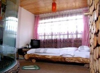 фото отеля Lijiang 0888 Warm Inn