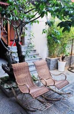 фото отеля Lijiang Wolong Villa