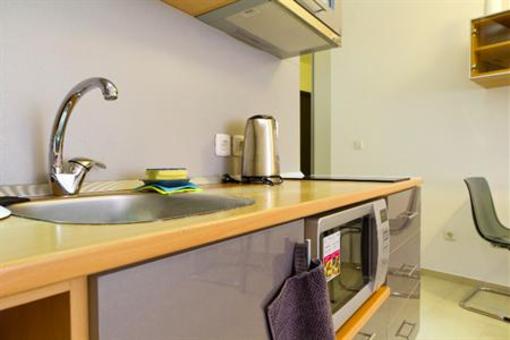 фото отеля Nexus Apartments