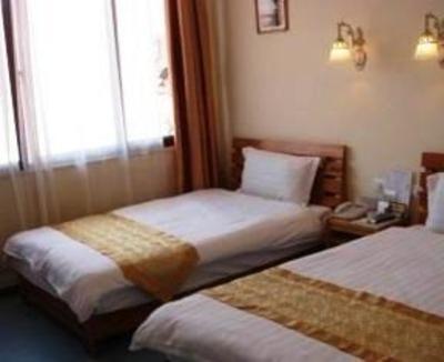 фото отеля Xishuangbanna Bodhi Island Business Hotel
