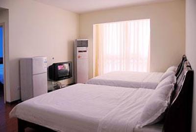 фото отеля Holiday Time Apartment Hotel Guanyin Bridge