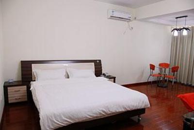 фото отеля Holiday Time Apartment Hotel Guanyin Bridge