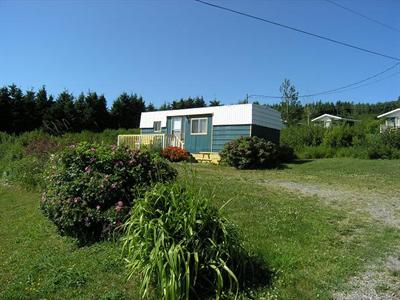 фото отеля Motel Chalets Baie De Gaspe