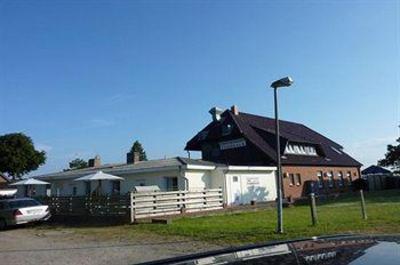 фото отеля Fahrhaus Fehmarnsund Gastehaus Ferienwohnungen