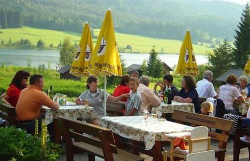 фото отеля Ferienhaus Winkler Tuschnig Pension Weissensee