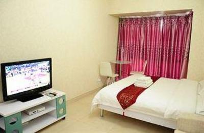 фото отеля Shengang Apartment Hotel Yuhedi