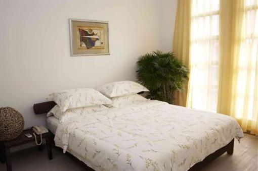 фото отеля Lilac International Suites