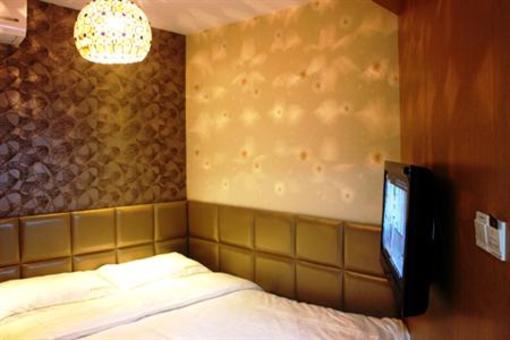 фото отеля Chuangyi Shishang Business Hotel Minjiang Qingdao