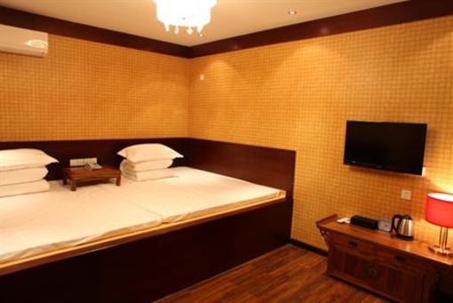 фото отеля Chuangyi Shishang Business Hotel Minjiang Qingdao