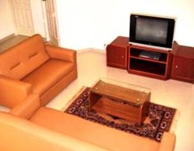 фото отеля Aranha Homes - Trinity Grand