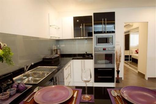 фото отеля Tudor Court Serviced Apartments