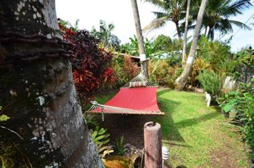фото отеля The Bali House & Bali Cottage at Kehena Beach