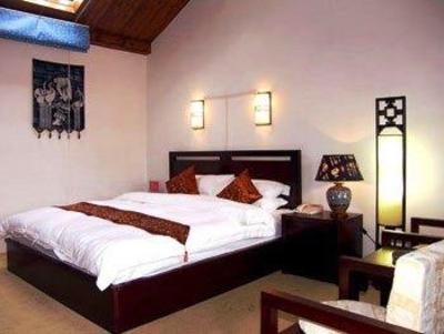 фото отеля Bashilai Inn Lijiang Bayi