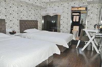 фото отеля Hyperspace Boutique Hotel Qingdao Lijin Road