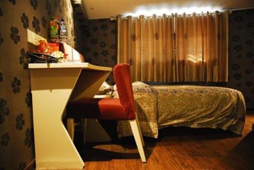фото отеля Hyperspace Boutique Hotel Qingdao Lijin Road