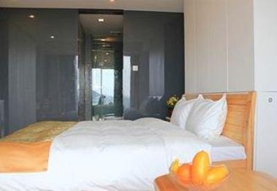 фото отеля Qingdao Tujia Vacation Rentals Tiantai Finance Square