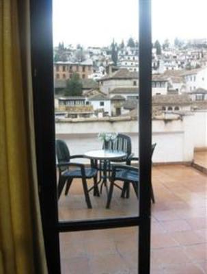 фото отеля Apartamentos Turisticos Santa Ana Granada