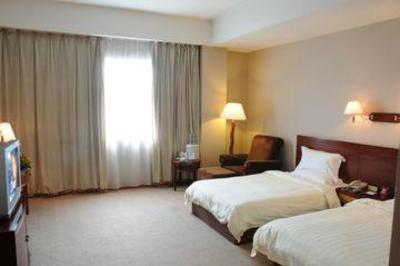 фото отеля Shiner Hotel Diqing