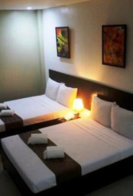 фото отеля Holiday Suites Puerto Princesa City