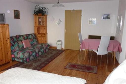 фото отеля Ferienwohnung & Gästezimmer Familie Englstorfer