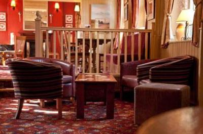 фото отеля Black Lion Harvester & Innkeeper's Lodge
