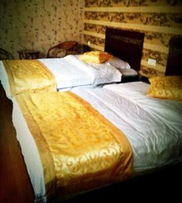 фото отеля Songhetang Hostel