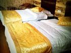 фото отеля Songhetang Hostel
