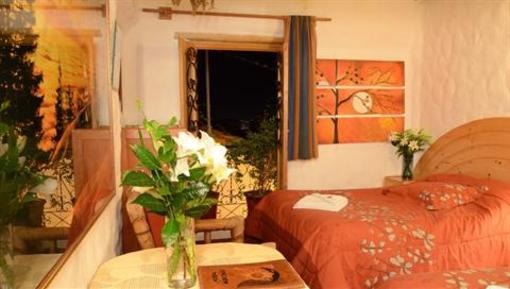 фото отеля Hostal Madre Tierra